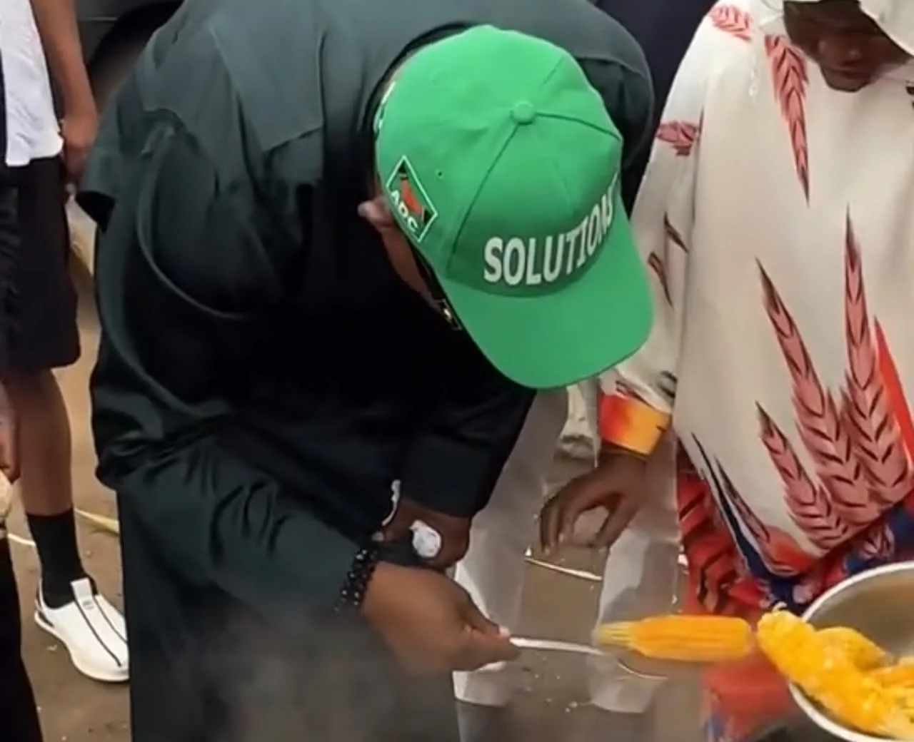 Oyo ADC Governorship Aspirant Shares Corn with Supporters During Political Outreach